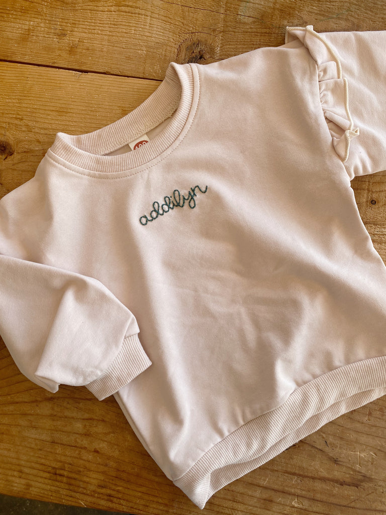 The Embroidered Ruffle Romper / Sweatshirt